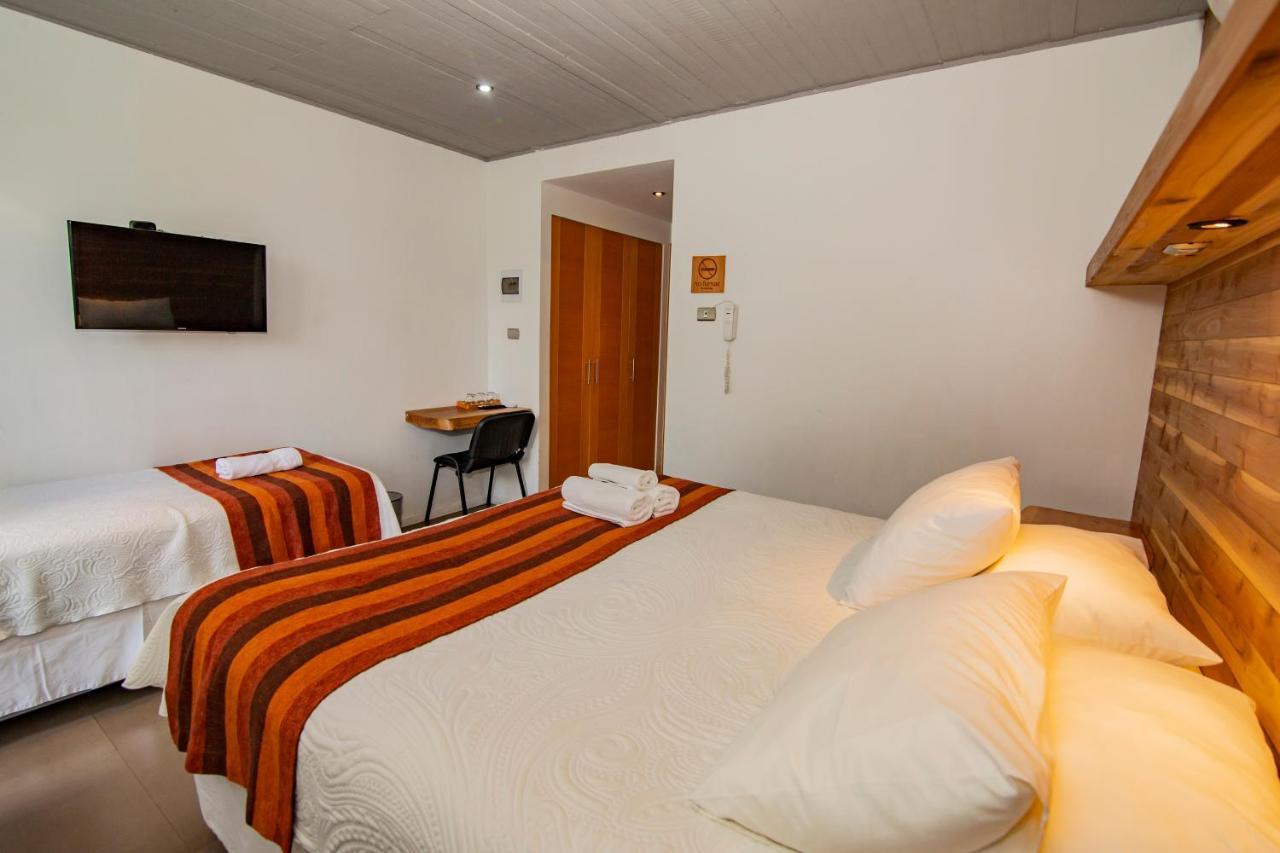 Hotel Cumbres Del Sur ปูกอน ภายนอก รูปภาพ